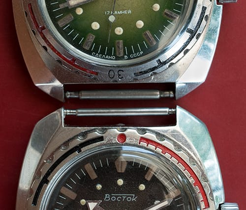 Vostok Ministry different cases: older one above, newer one below